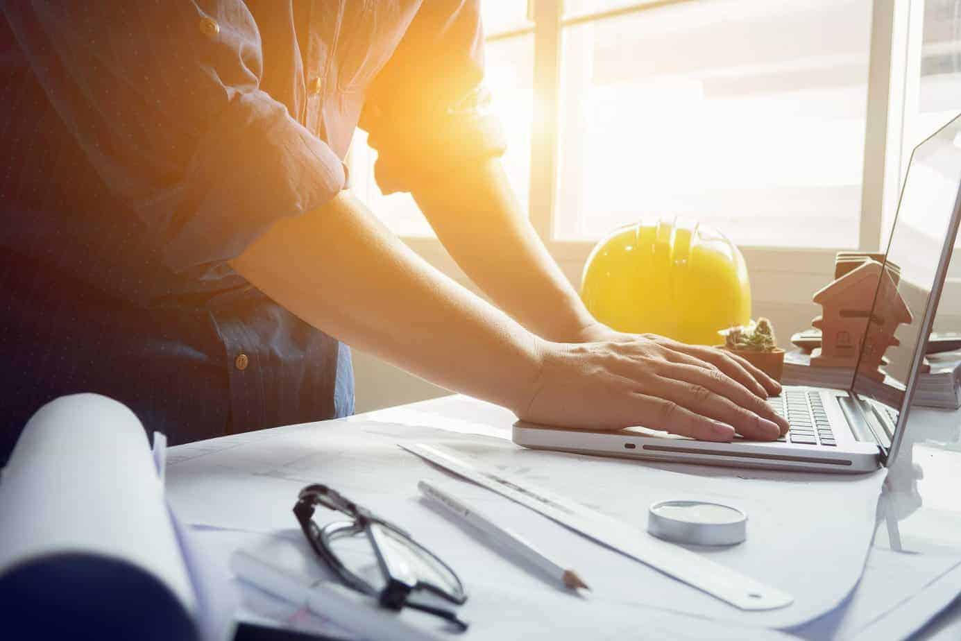 A construction business owner working out which part of the business to focus on